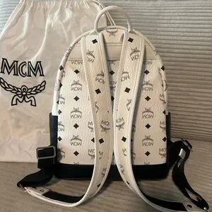 MCM | Bags | Mcm Black And Brown Backpack With Signature  display picture 1